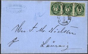 16 Ib. 1 skilling Posthorn i 3-stripe på brevomslag, stemplet "Christiania 5.8.1875".