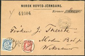 46 a,53 I. 30 øres innenlandsporto. 20 øre 21 mm og 10 øre 20 mm på bankokonvolutt (Kr 200,-), stemplet "Christiania 7.6.86" og ved siden "Randsfjordbanens Postexp. 8.6.86".