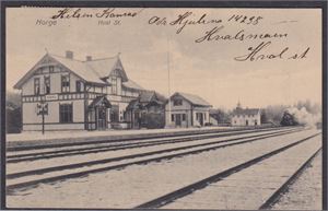Hval St. (JHKü,1547) st. Hvals Station 18-II-18.  Tog dampende inn.