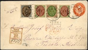 D.W.I. A 3c stationary envelope upfranked with two 1c, one 10c and one 12c, cancelled "St. Thomas 10.11.1896" and sent registered to Trieste, Austria.