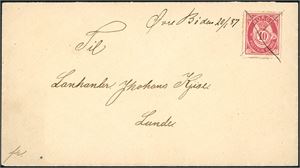 53. 10 øre 20 mm på konvolutt, anert med blekkryss, og ved siden skrevet "Øvre Bø den 20/1 87" og sendt til Lunde.