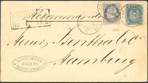 40 I,40 II. 40 øres porto til Tyskland. To ulike 20 øre blå 1883 på rekommandert konvolutt til Hamburg, stemplet "Christianssand 9.10.84". Transitt- og ankomststempel på baksiden.