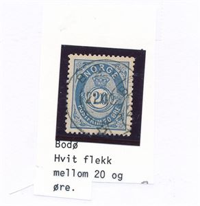 Nk 54 IV o. Hvit flekk mellom 20 og øre