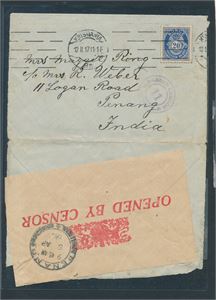 Nk 103 på brev maskinstemplet "KRISTIANIA 12 II 17" til Penang, India (i dag Malaysia). Sensurert og oppsprettet i sidene for å kunne stilles ut