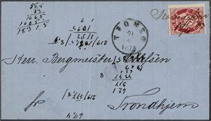 18. 3 skilling Posthorn på brevomslag til Trondhjem, annullert med håndskrevet "Komagfjord 19/6 75". Ved siden transittstemplet "Tromsø". Omslaget med noen notater.
