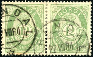 44. 12 øre mattgrønn i horisontalt par, stemplet "Arendal 22.7.84". Begge merkene er signert FCM.
