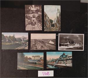 REICH-POSTKORT 7 småformat med jernbanemotiv. 5 stk er  postgått og frankert med Germania-merker