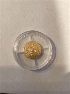 En liten Europamedalje på 0,5 gram gull (585/100)