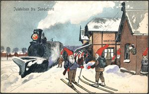 Julehilsen fra Sandefjord. Nisser på ski på Jernbanestationen. Brukt i 1917. K-1