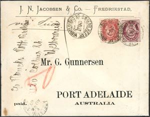 30,53 II. 60 øres porto til Australia. 50 øre skravert Posthorn og 10 øre 20 mm på konvolutt til Port Adelaide, stemplet "BureauReexp. De Christiania 12.7.87". Konvolutten er påskrevet ny adresse i venstre side og videresendt til Melbourne. Baksiden med 4 stempler, bl.a. "Brindisi" og "Melbourne".