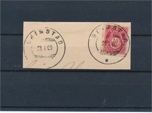 Klipp med Nk 77 hjelpestempel "GRIMSTAD 21-I-09"