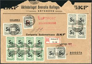 SCADTA LA 675,LA 677,Columbia 241. A somewhat broken envelope from the Swedish company "Aktiobolaget Svenska Kullager SKF" (A world leading company making Ball Bearing) franked with eight 10 c- and six 20 c SCADTA with overprint "SU" (Sweden), one 20 c with both overprint "R" in red and "SU", together with twenty 2 c Colombia 1917 (all the 2 c are on reverse), cancelled "Serwicio de Transportes Aereos Barranquilla 7.6.1929" and sent as as recommende mail with Airmail to Bogota, Colombia. "Servicio Transportes Aereos Bogota 10.6.1929" cds at reverse. One 20 c SCADTA with minor fault.