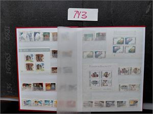 PORTUGAL/NEW + NOUELLES HEBRIDES Artig landekombinasjon i 16 siders bok. Brukt og ubrukt, her kan være gode typer av overtrykkene  på Hebrides