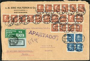 Four 25 øre- and twenty 30 øre Carl on envelope from the Swedish company "A.-B. eric Hultgren & Co", cancelled "Gøteborg 17.12.29" and sent with Air Mail to Bogota, Colombia. One normal Swedish Airmail-label and one green label "By Airmail Via SCADTA" at side. Arrival postmark "Servicio Transportes Aereos Bogota 19.1.1930"at reverse.