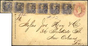 U.S.A. A 3 c stationary envelope upfranked with a strip of six of the 3 c 1869 and sent to New Orleans.