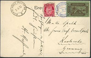 100,Spitsbergen E 17. 10 øre Posthorn på postkort til Tyskland, stemplet "Nordlands Postexp. C 20.7.12". Ved siden påsatt en 5 øres grønn/brun Spitsbergen-etikett, som er stemplet "Magdalena Bay Spidsbergen 13 Juli 12".