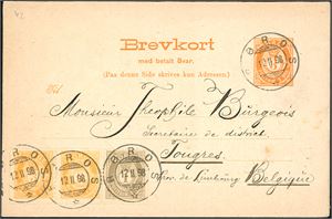 65,66. 10 øres porto til Belgia. 3 øres dobbelt Brevkort, oppfrankert med en 1 øre- og to 3 øre grovtagget Knudsen, stemplet "Røros 12.2.98". Svar-Brevkortet er frankert med de samme merkene, men ikke stemplet eller brukt.