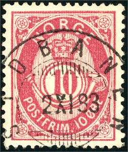38 xY. 10 øre Posthorn 1883 på papir fra Moestue med stående vannmerke, stemplet "Sydbanen 2.11.83". Attest Aune.