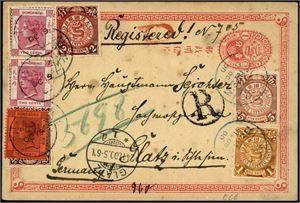 China. A 1c statioary-card uprated with three Chinees stamps and three from Hong Kong, sendt registered to Germany in October 1900.