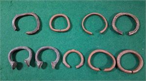 "MANILLAS" -samling afrikanska manillaringar  i koppar/brons. Parti nio st. bestående av flera kraftiga