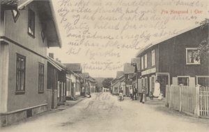 Hokksund "Fra Hougsund i Eker"  (HL&Co) st. Burud 6-III-17  Flott gatemotiv med folk og butikk