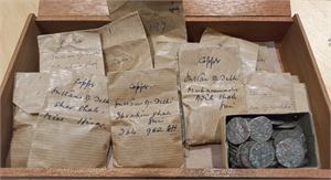 Some old Indian/Indian states coins in a small box.