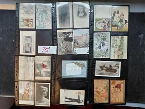 Diverse kort i ringperm. Mange forskjellige motiver, alt avbildet.