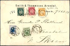 32,33,75,77,82. 298 øres innenlandsporto. 1 kr- og 1 1/2 kr Oscar sammen med 3 øre- 10 øre og  35 øre fintagget Knudsen på bankokonvolutt (Kr 7563,77) til Wraadal pr. Skien, stemplet "Arendal 11.12.03". Baksiden med to segl hvorav et fra "Arendal postktr." samt transittstempel "Bandaks Postexp. 14.12.03". Konvolutten med noen mindre "skrukker og 10 øren med rundt hjørne.