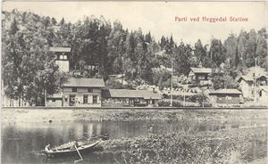 Jernbane.  Heggedal, Parti ved Heggedal Station.  Frimerke revet av.  Stemplet Heggedal 5-8-20