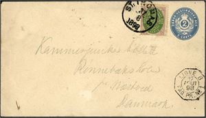 D.W.I. A 2 c stationary envelope upfranked with 12 c (2.print) and sent to Denmark in 1898. The 12 c with minor faults. Cert. C.Aa.Møller.