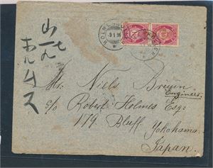 Nk 77 I x2 på brev til Yokohama, Japan stemplet "HOLMENKOLLEN 9 I 99". 2 japanske stempler bak