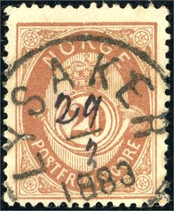 39. 20 øre brun , fullstemplet "Lysaker 1883" der datoen 29/2" er skrevet med blekk.
