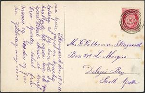 100. 10 øre posthorn på postkort, anert med 4-rings "298" (Spedalen, Fjære, AA), og sendt til Syd-Afrika. Kortet er datert "Skovgaard den 18-9-10".